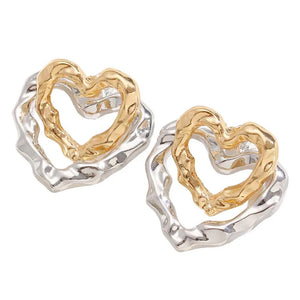 Pair of Heartelle earrings laid flat